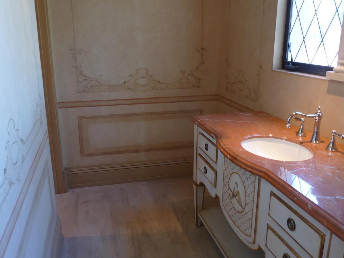 Gold leaf bathroom vanity